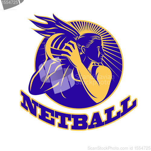 Image of  netball player holding passing ball 