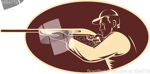 Image of hunter shooting aiming shotgun rifle