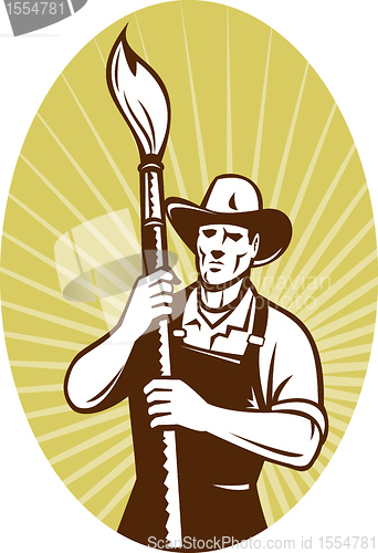 Image of cowboy painter with paintbrush