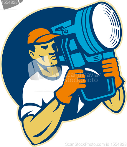 Image of film lighting crew holding a spotlight