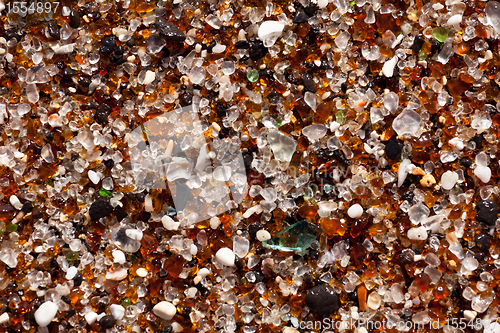 Image of Closeup of glass fragments on beach