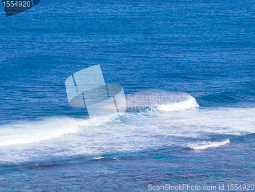 Image of Rainbow colors in spray from waves