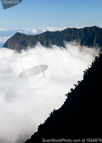 Image of Fog forms on Kalalau valley Kauai