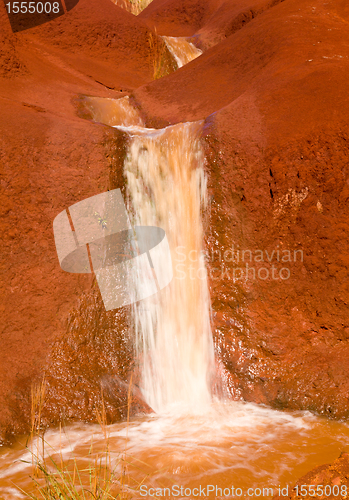 Image of Cascading river in dry red rocks