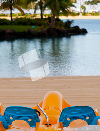 Image of Pedalos on beach by ocean