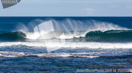 Image of Rainbow colors in spray from waves