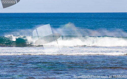 Image of Rainbow colors in spray from waves