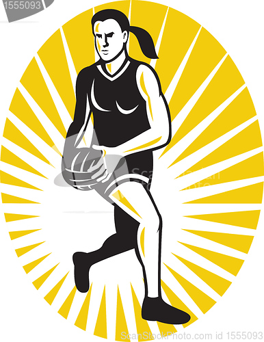 Image of netball player running with the ball