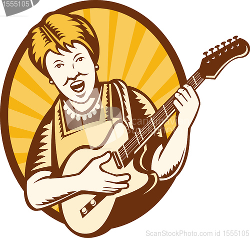 Image of randmother old woman playing the electric guitar