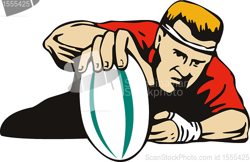 Image of rugby player scoring a try 