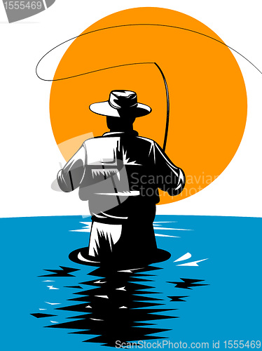 Image of fly fisherman with rod and reel