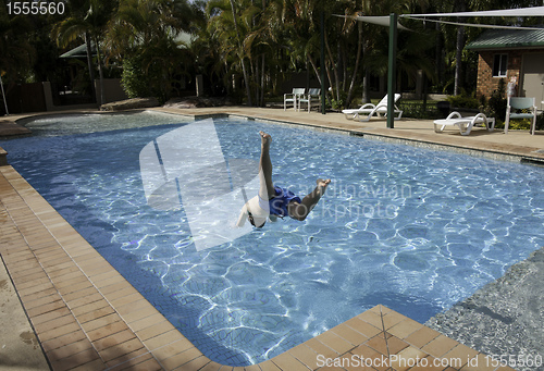 Image of jumping into swimming pool