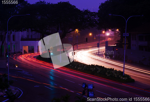 Image of car road lights at sunset