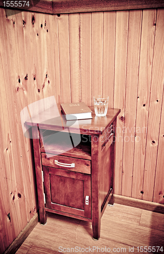 Image of bible on bed side table