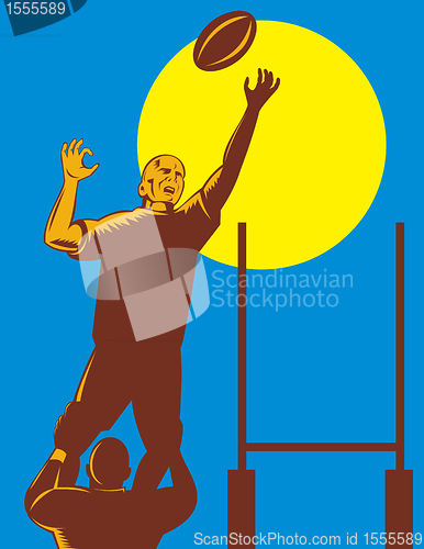 Image of rugby player catching the ball lineout