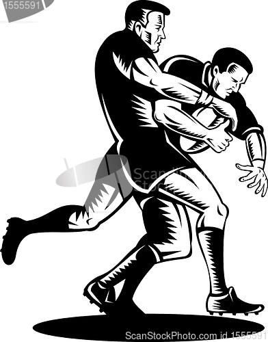 Image of rugby player running passing the ball