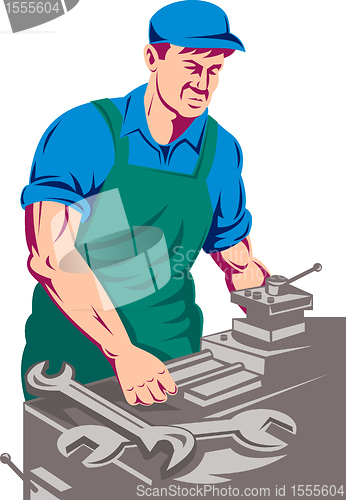 Image of turner worker at work on lathe