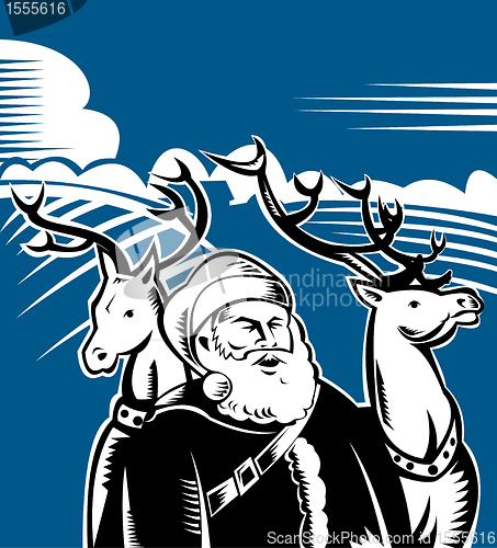 Image of Father Christmas Santa Claus with reindeer 