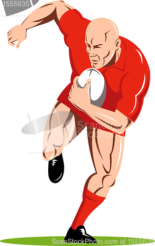 Image of ugby player running passing the ball