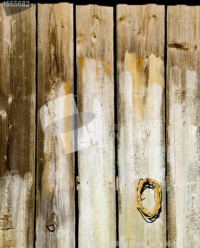 Image of Old wooden rural house wall made of plank backdrop 