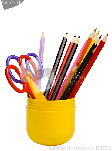 Image of Some scissors and pencils in a cup