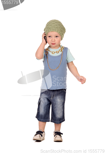 Image of Little boy talking by the phone