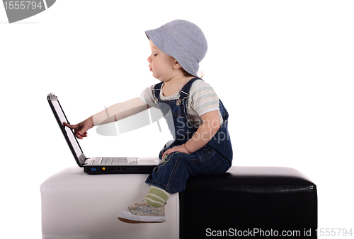 Image of Little boy with a laptop