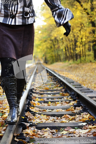 Image of Women walking on rails