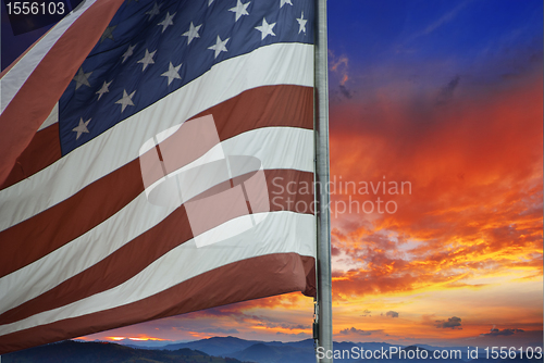 Image of Sunset over American Flag