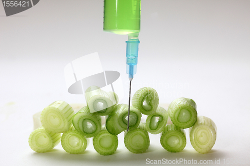 Image of Injection into fresh young onion