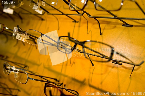 Image of eyeglasse frames on wall display