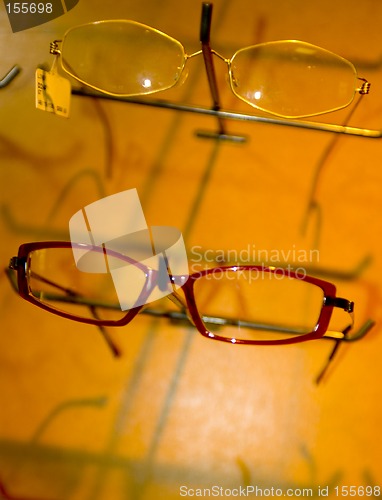 Image of eyeglasse frames on wall display