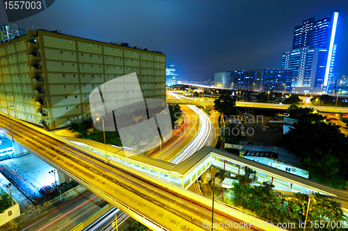 Image of traffic and highway at night