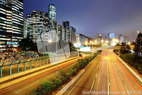 Image of traffic on highway in urban at night