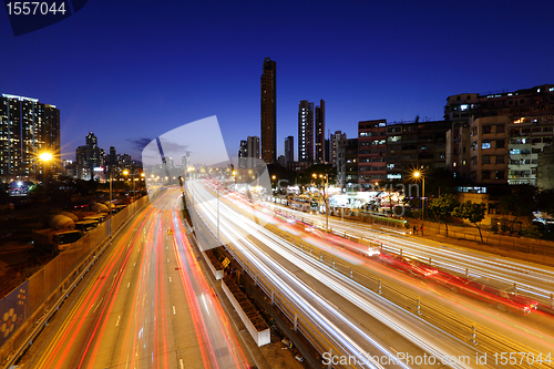 Image of traffic on highway in urban at night