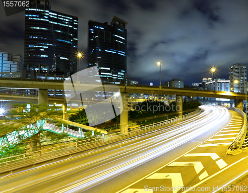 Image of traffic on highway in urban at night