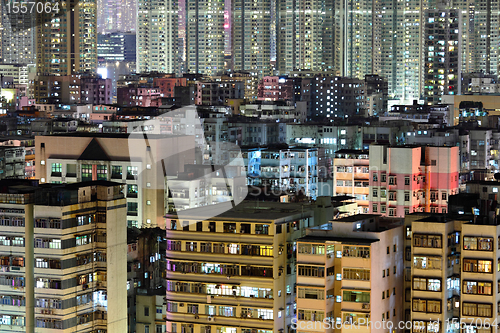 Image of crowded building at night in Hong Kong