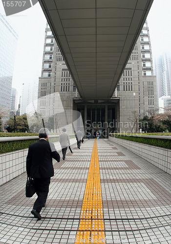 Image of Business men going to work