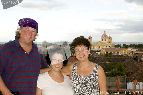 Image of middle age tourists view of Cathedral of Granada Nicaragua