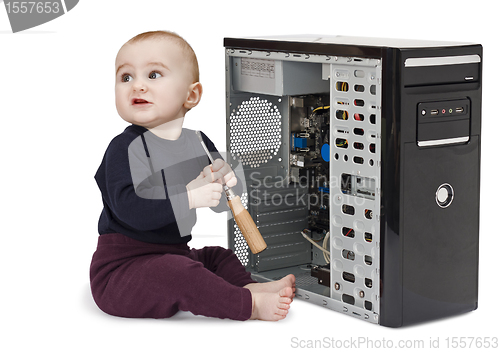 Image of young child with open computer