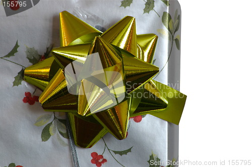 Image of present and golden bow closeup