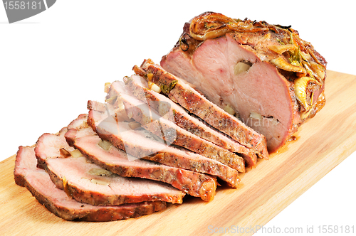 Image of Roast pork on a wooden board
