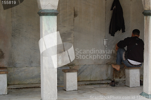 Image of Washing feet before prayer