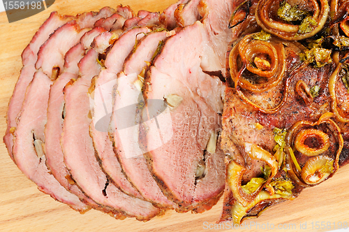 Image of Roast pork on a wooden board