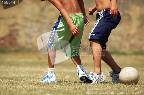 Image of Boys playing football
