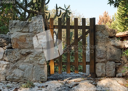 Image of Small wooden wicket or gate of Mediterranean house