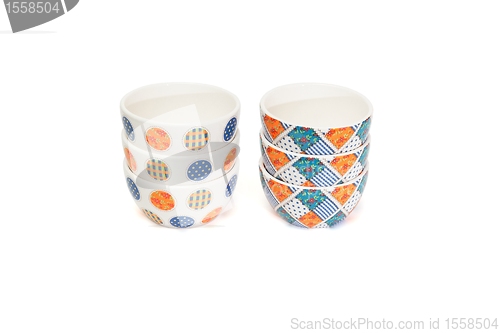 Image of Two stacks of porcelain bowls isolated