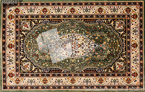 Image of Persian rug with floral pattern