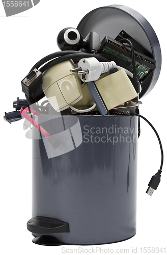 Image of trashcan with electronic waste