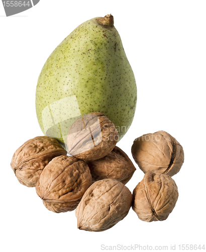 Image of one pear and many nuts